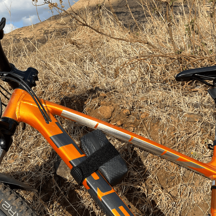 Koala bag on a dirt trail — shows water and dust resistant performance