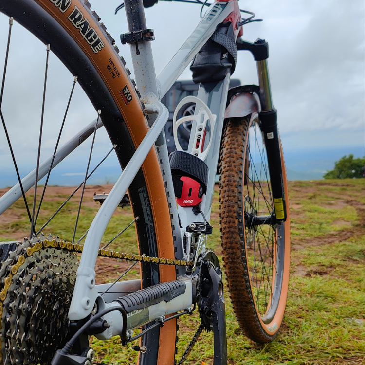 Black and Red Metal strap mount for mountain bike to attach spare tube, CO2 Cartridges, multitool, Bottle cage and accessories