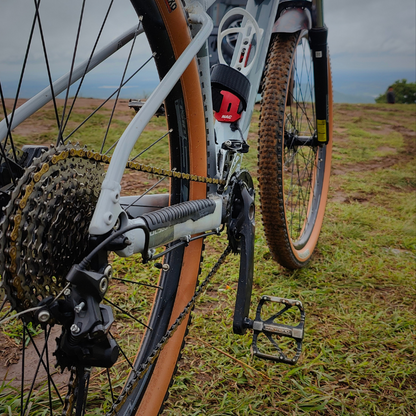 Black and Red Metal strap mount for mountain bike to attach spare tube, CO2 Cartridges, multitool, Bottle cage and accessories