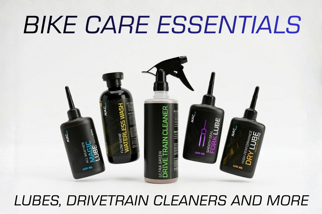 Collection of bike care products including lubricants and cleaners on a white background with 'Bike Care Essentials' text.