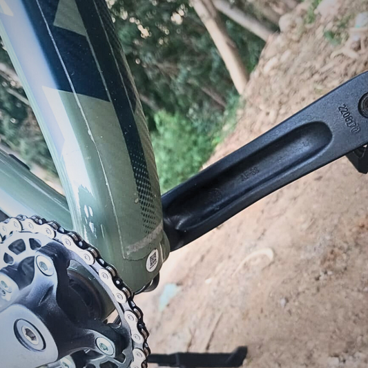 Transparent cycle downtube protector frame guard protection against rocks, mud, and trail damage