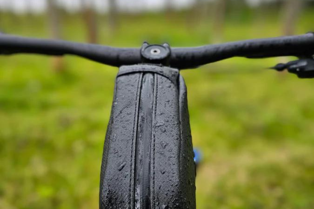 weather resistant top tube storage bag for cycles