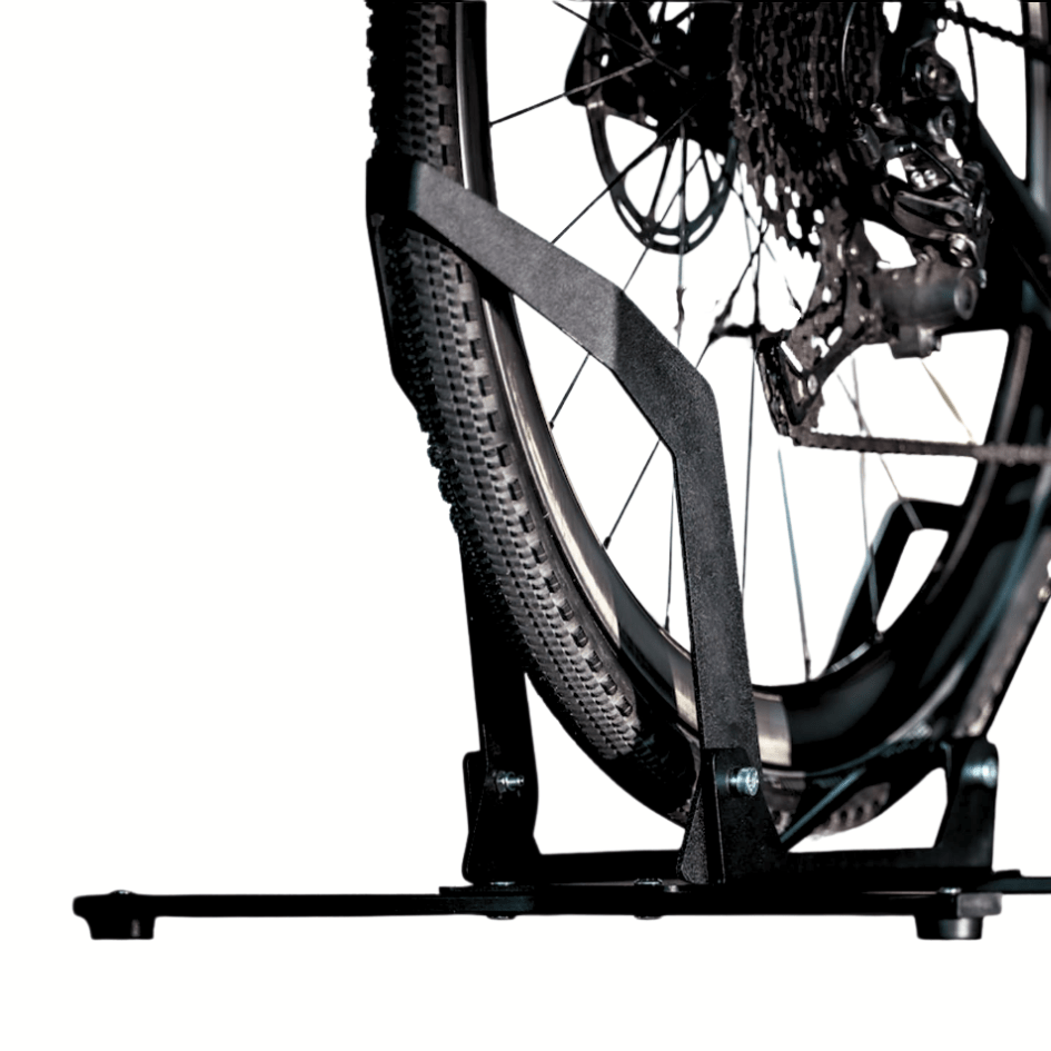 Bear Trap spring-loaded wheel clamp gripping a bicycle tyre - NAC