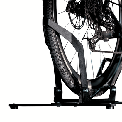 Bear Trap spring-loaded wheel clamp gripping a bicycle tyre - NAC