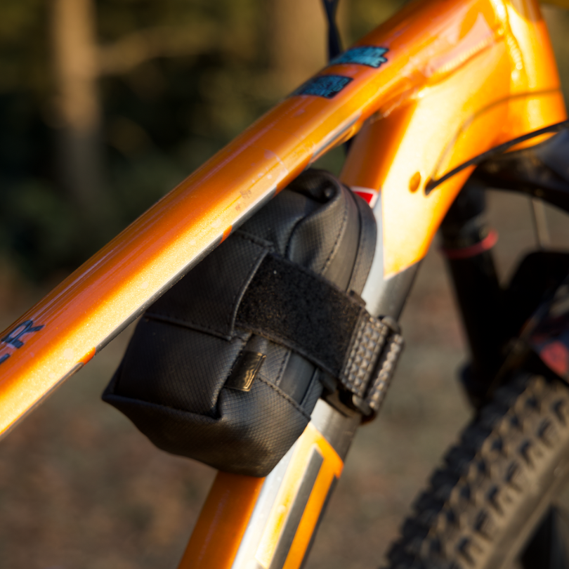 compact frame bag for cycles on a orange mtb